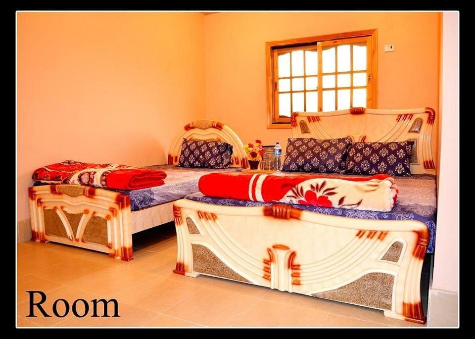 Palm Valley Hotel Sukkur Buitenkant foto